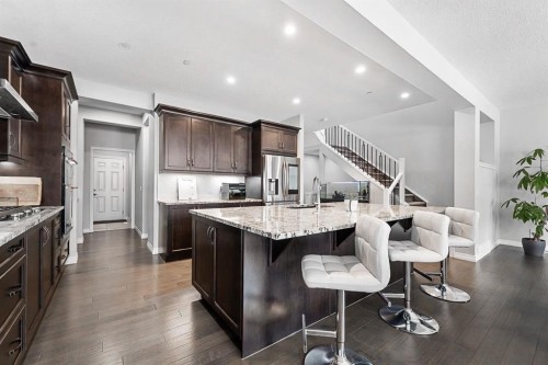 308 Lucas Way Nw, Calgary, AB - Indoor Photo Showing Kitchen With Upgraded Kitchen