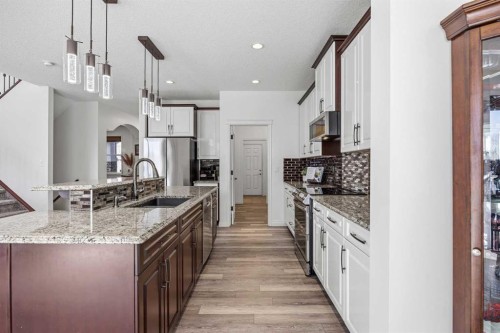 30 Ranchers Crescent, Okotoks, AB - Indoor Photo Showing Kitchen With Upgraded Kitchen