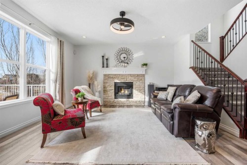 30 Ranchers Crescent, Okotoks, AB - Indoor Photo Showing Living Room With Fireplace