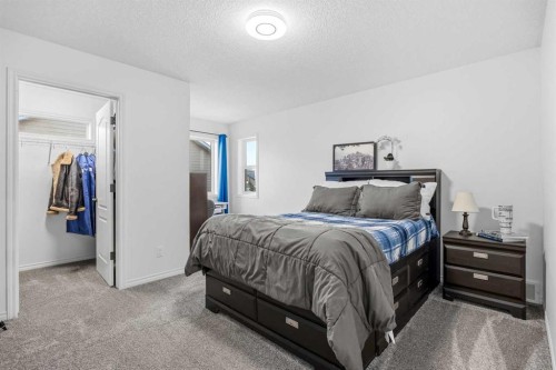 30 Ranchers Crescent, Okotoks, AB - Indoor Photo Showing Bedroom