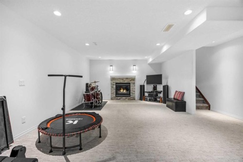 30 Ranchers Crescent, Okotoks, AB - Indoor With Fireplace