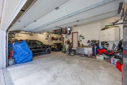30 Ranchers Crescent, Okotoks, AB - Indoor Photo Showing Garage