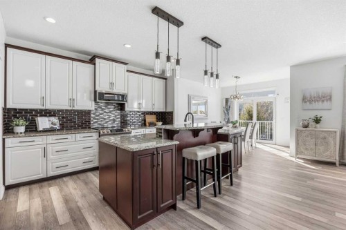 30 Ranchers Crescent, Okotoks, AB - Indoor Photo Showing Kitchen With Upgraded Kitchen