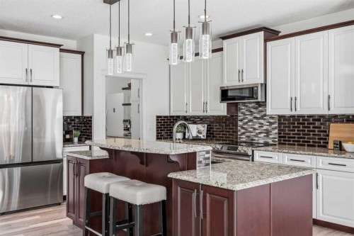 30 Ranchers Crescent, Okotoks, AB - Indoor Photo Showing Kitchen With Upgraded Kitchen