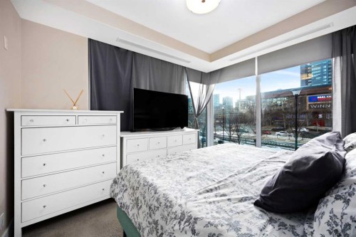 574 Riverfront Lane Se, Calgary, AB - Indoor Photo Showing Bedroom