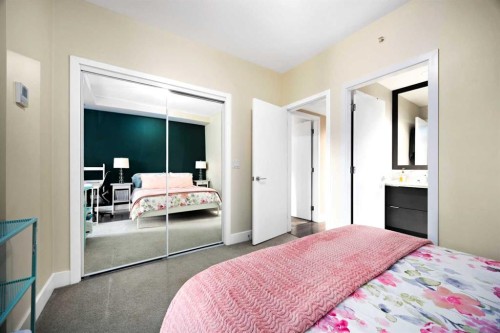 574 Riverfront Lane Se, Calgary, AB - Indoor Photo Showing Bedroom