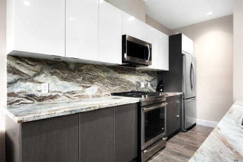 574 Riverfront Lane Se, Calgary, AB - Indoor Photo Showing Kitchen With Stainless Steel Kitchen