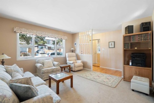 59 Hogarth Crescent Sw, Calgary, AB - Indoor Photo Showing Living Room