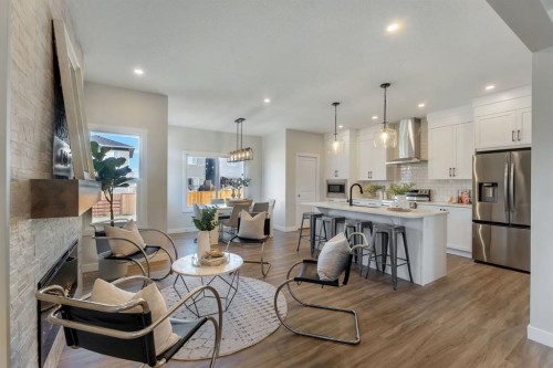 11 Fireside Common, Cochrane, AB - Indoor Photo Showing Kitchen With Stainless Steel Kitchen With Upgraded Kitchen