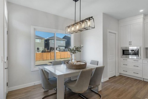 11 Fireside Common, Cochrane, AB - Indoor Photo Showing Dining Room