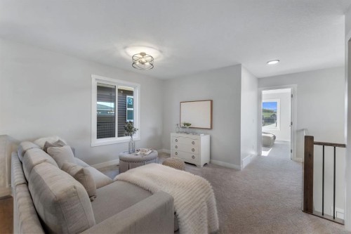 11 Fireside Common, Cochrane, AB - Indoor Photo Showing Bedroom