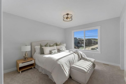 11 Fireside Common, Cochrane, AB - Indoor Photo Showing Bedroom