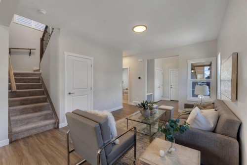 11 Fireside Common, Cochrane, AB - Indoor Photo Showing Living Room