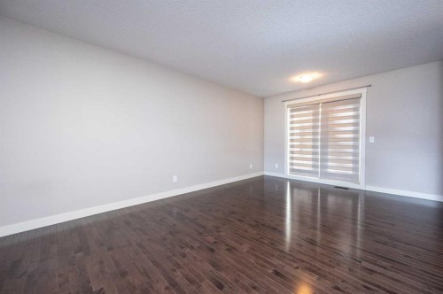 57 Aspen Hills Common Sw, Calgary, AB - Indoor Photo Showing Other Room
