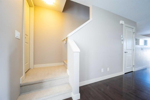 57 Aspen Hills Common Sw, Calgary, AB - Indoor Photo Showing Other Room