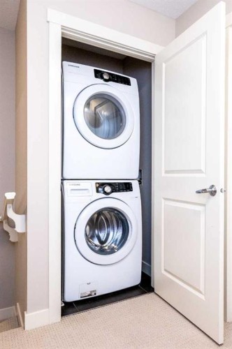 57 Aspen Hills Common Sw, Calgary, AB - Indoor Photo Showing Laundry Room