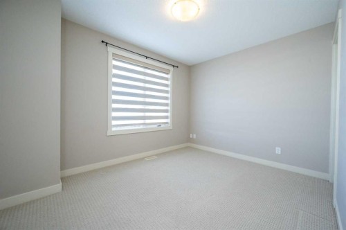 57 Aspen Hills Common Sw, Calgary, AB - Indoor Photo Showing Other Room