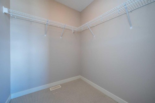 57 Aspen Hills Common Sw, Calgary, AB - Indoor With Storage