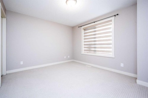 57 Aspen Hills Common Sw, Calgary, AB - Indoor Photo Showing Other Room