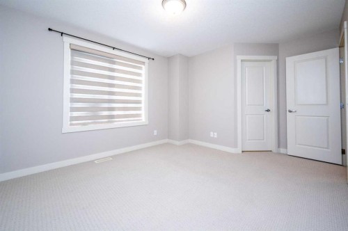 57 Aspen Hills Common Sw, Calgary, AB - Indoor Photo Showing Other Room