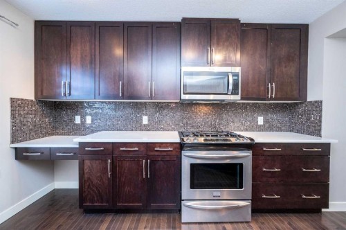 57 Aspen Hills Common Sw, Calgary, AB - Indoor Photo Showing Kitchen With Upgraded Kitchen