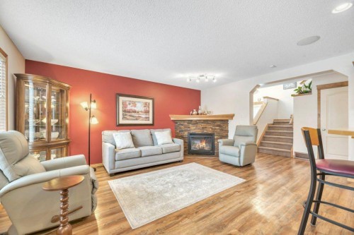187 Brightondale Crescent Se, Calgary, AB - Indoor Photo Showing Living Room With Fireplace