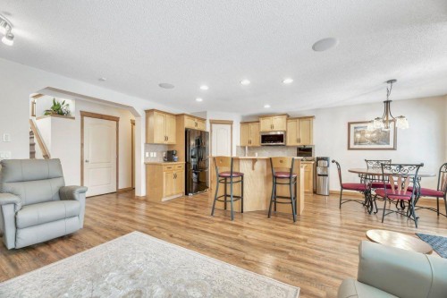 187 Brightondale Crescent Se, Calgary, AB - Indoor Photo Showing Living Room