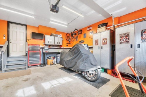 187 Brightondale Crescent Se, Calgary, AB - Indoor Photo Showing Garage