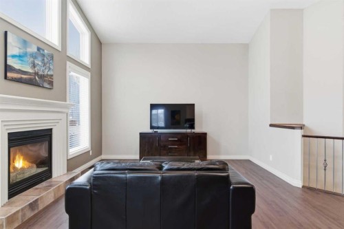 1151 Westmount Drive, Strathmore, AB - Indoor Photo Showing Living Room With Fireplace