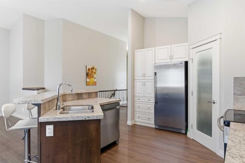 1151 Westmount Drive, Strathmore, AB - Indoor Photo Showing Kitchen With Stainless Steel Kitchen With Double Sink