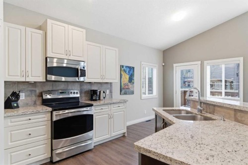 1151 Westmount Drive, Strathmore, AB - Indoor Photo Showing Kitchen With Double Sink
