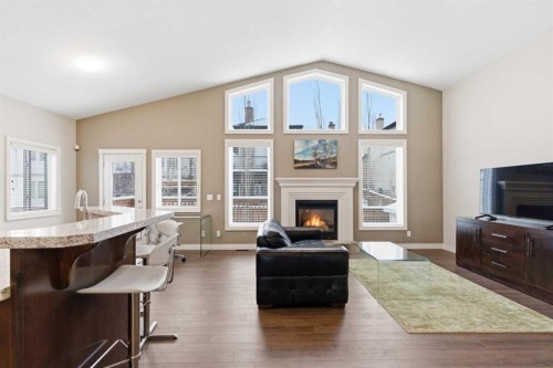 1151 Westmount Drive, Strathmore, AB - Indoor Photo Showing Living Room With Fireplace