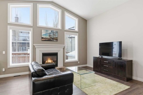 1151 Westmount Drive, Strathmore, AB - Indoor Photo Showing Living Room With Fireplace