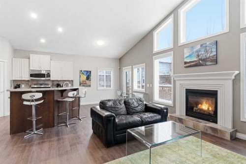 1151 Westmount Drive, Strathmore, AB - Indoor Photo Showing Living Room With Fireplace