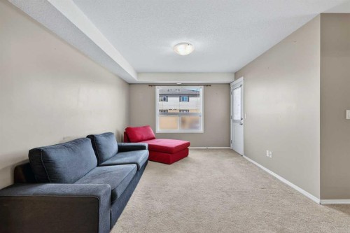 302-8 Bayside Place, Strathmore, AB - Indoor Photo Showing Living Room
