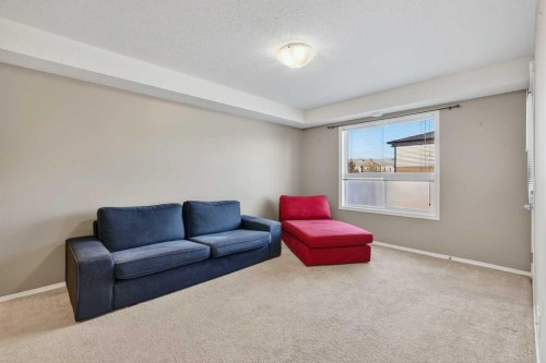 302-8 Bayside Place, Strathmore, AB - Indoor Photo Showing Living Room