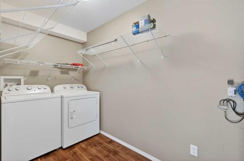 302-8 Bayside Place, Strathmore, AB - Indoor Photo Showing Laundry Room
