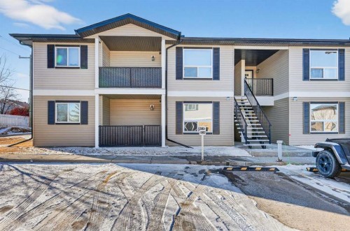 302-8 Bayside Place, Strathmore, AB - Outdoor With Facade