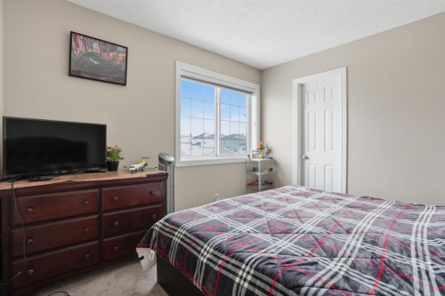 235 Coville Close Ne, Calgary, AB - Indoor Photo Showing Bedroom
