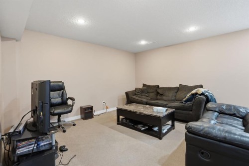 235 Coville Close Ne, Calgary, AB - Indoor Photo Showing Other Room
