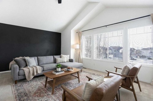 54 Springborough Point Sw, Calgary, AB - Indoor Photo Showing Living Room