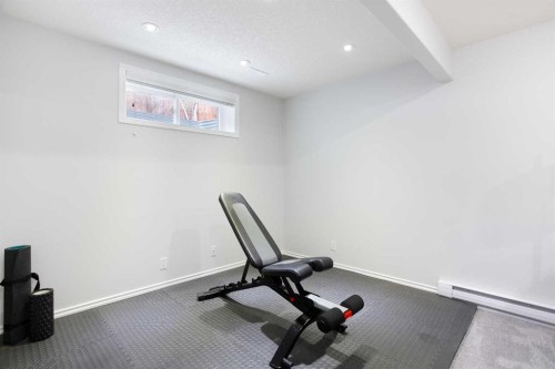 54 Springborough Point Sw, Calgary, AB - Indoor Photo Showing Gym Room