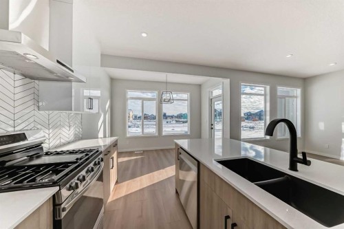 374 Corner Glen Way Ne, Calgary, AB - Indoor Photo Showing Kitchen With Double Sink With Upgraded Kitchen
