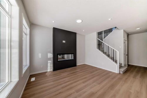 374 Corner Glen Way Ne, Calgary, AB - Indoor With Fireplace