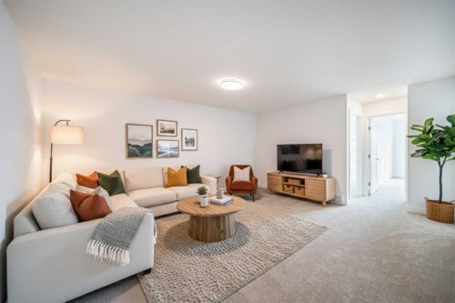 73 Royston Grove Nw, Calgary, AB - Indoor Photo Showing Living Room