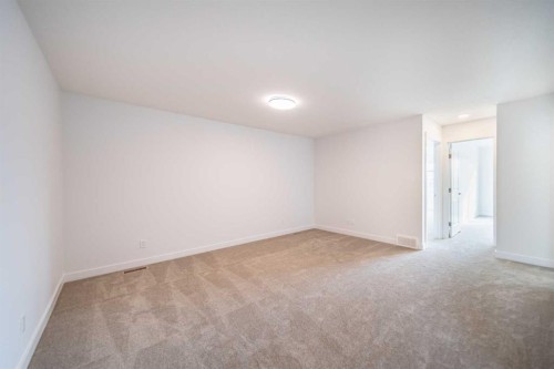 73 Royston Grove Nw, Calgary, AB - Indoor Photo Showing Other Room
