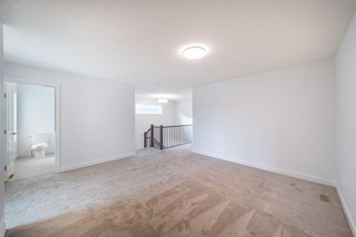 73 Royston Grove Nw, Calgary, AB - Indoor Photo Showing Other Room