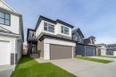 73 Royston Grove Nw, Calgary, AB  - Outdoor With Facade 