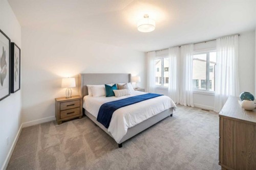 73 Royston Grove Nw, Calgary, AB - Indoor Photo Showing Bedroom