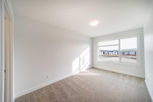 73 Royston Grove Nw, Calgary, AB - Indoor Photo Showing Other Room